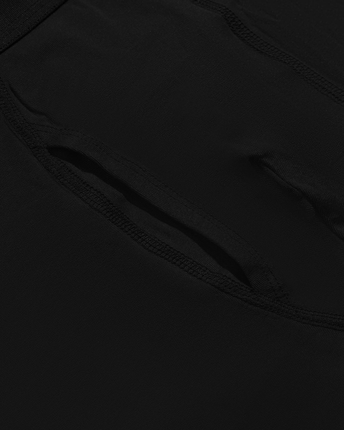Close-up of Black Boxer Briefs W/ Fly showing hidden vented pocket seam.