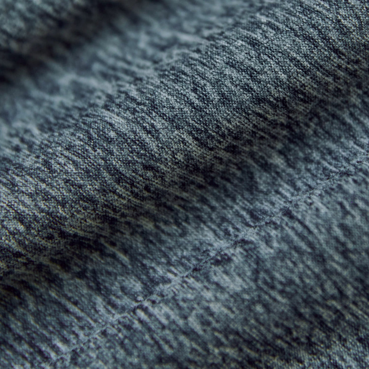 Heather Navy Active Short Sleeve Polo fabric detail showing yarn loops and seam.