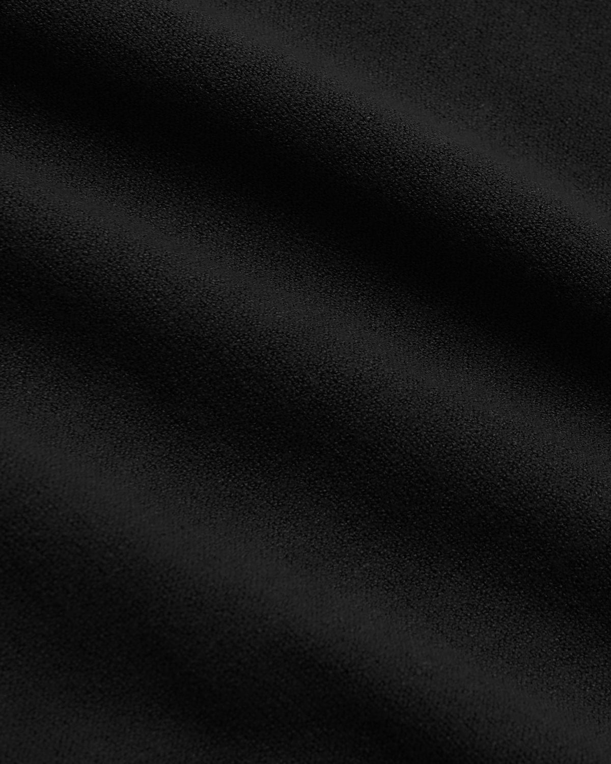 Black Tall Dressy Polo 6-Pack with textured, pebbled fabric folds.