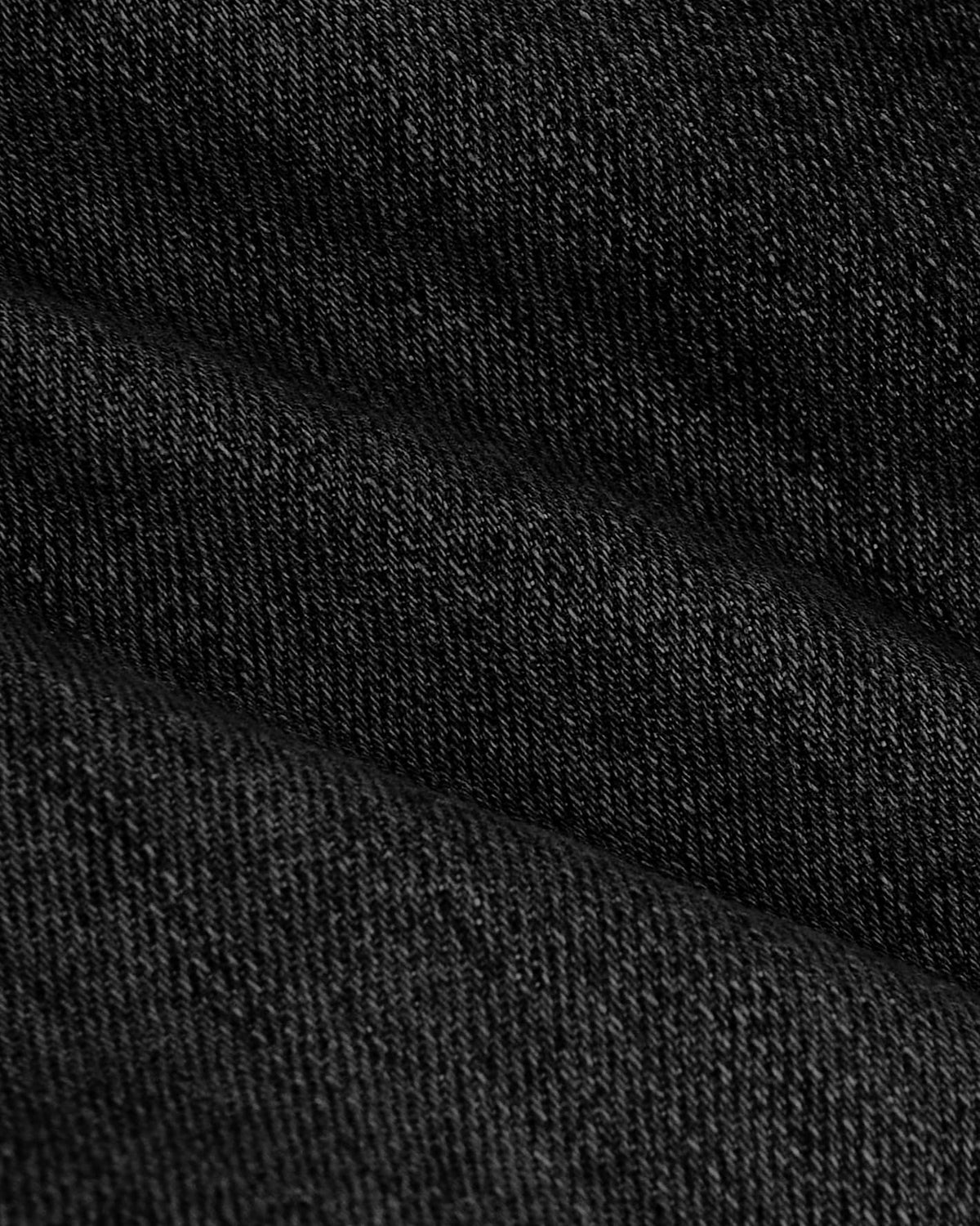 Close-up of Gray Wash Slim Authentic Denim Jeans, showcasing twill weave texture.