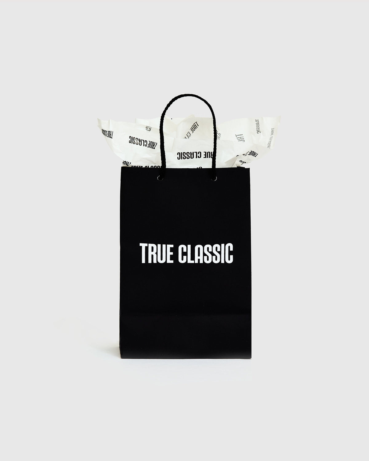 Gift Bag with braided handles and “True Classictees” print.