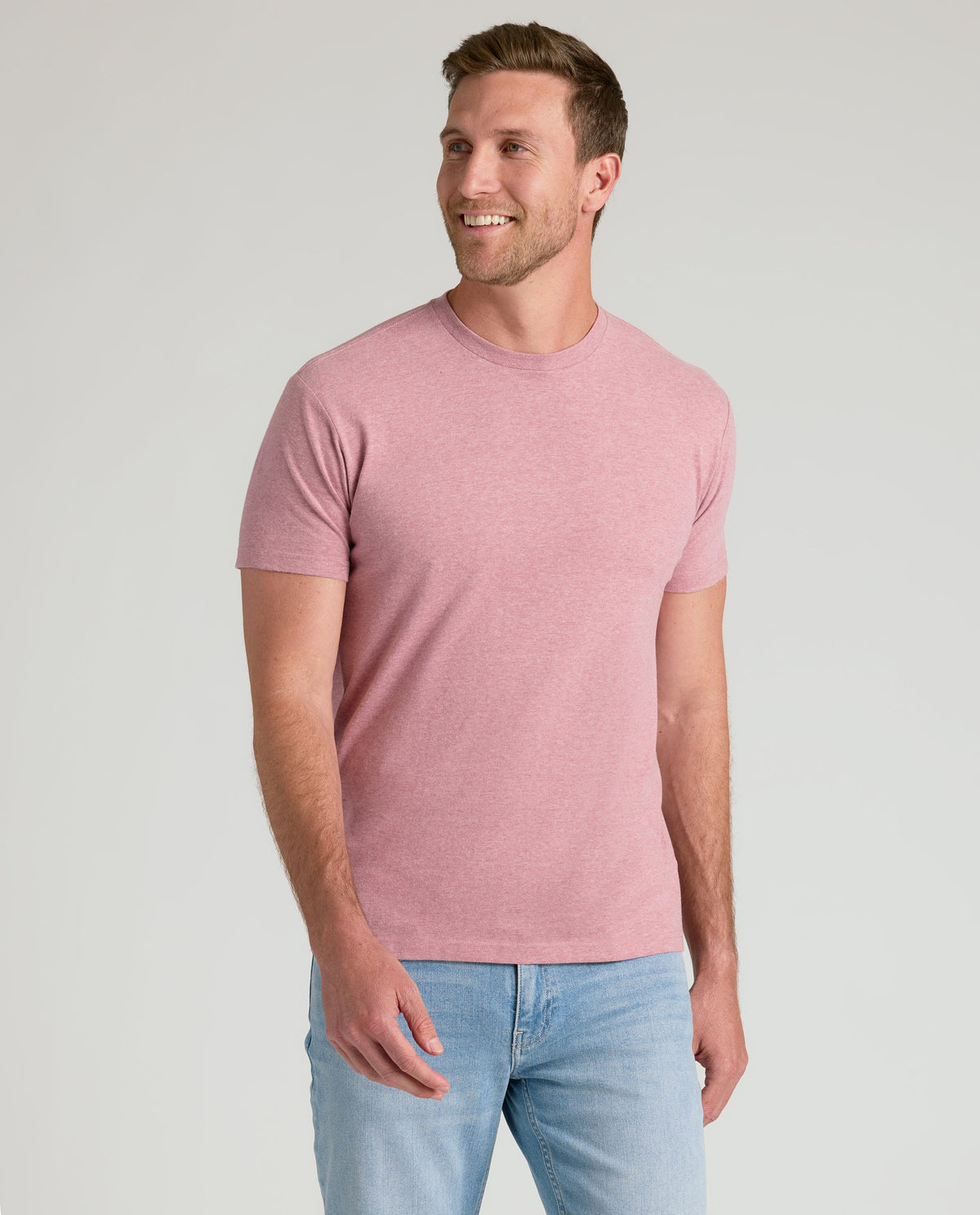 Model in Light Heather Boysenberry Classic Crew Neck and light-wash jeans.