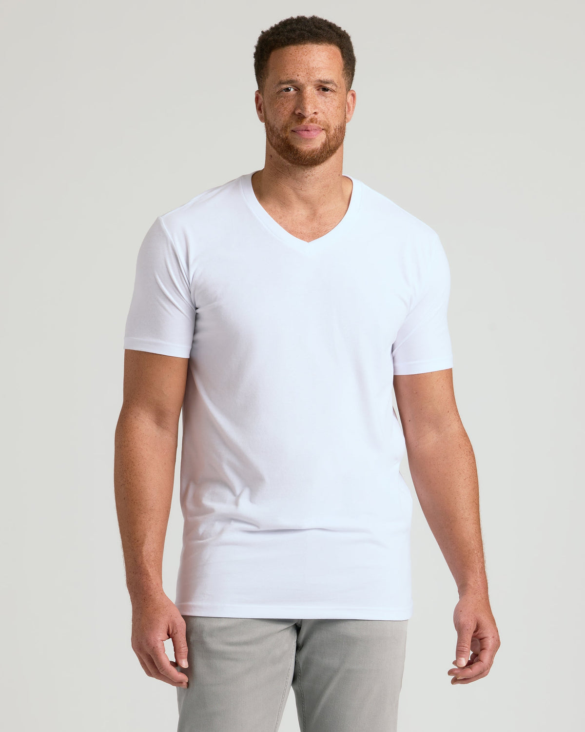 White Short Sleeve Tall Classic V-Neck T-shirt worn by a freckled man.