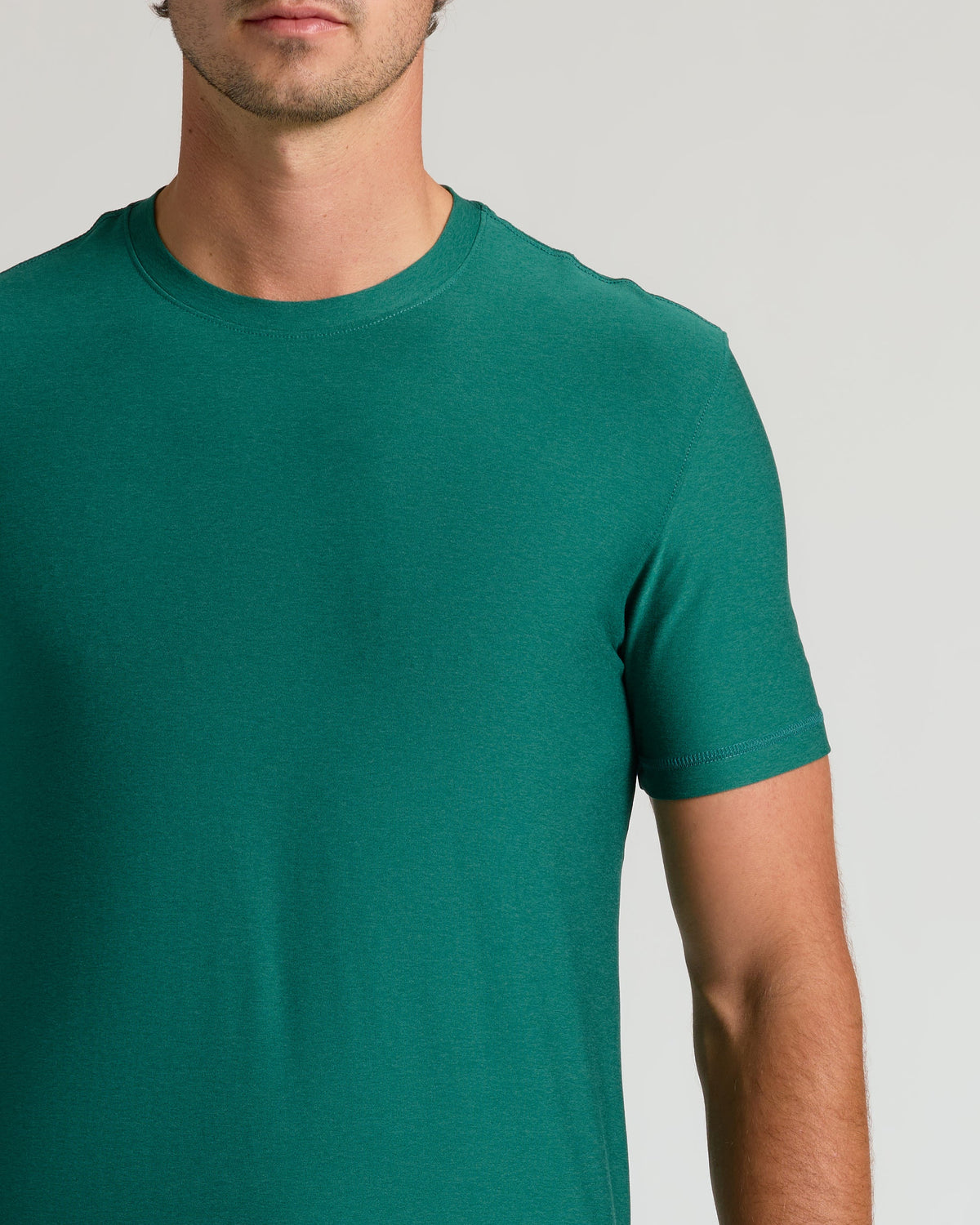 Clover Tall Active Crew Neck 2.0 on model, neutral backdrop.